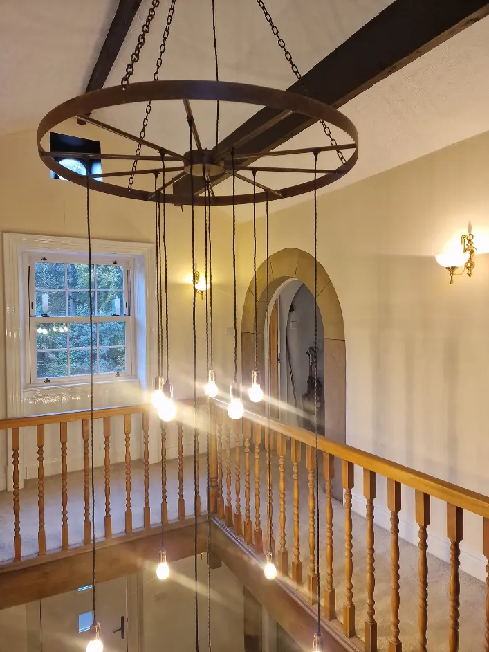 Galleried landing with an oak balustrade and freshly painted cream walls